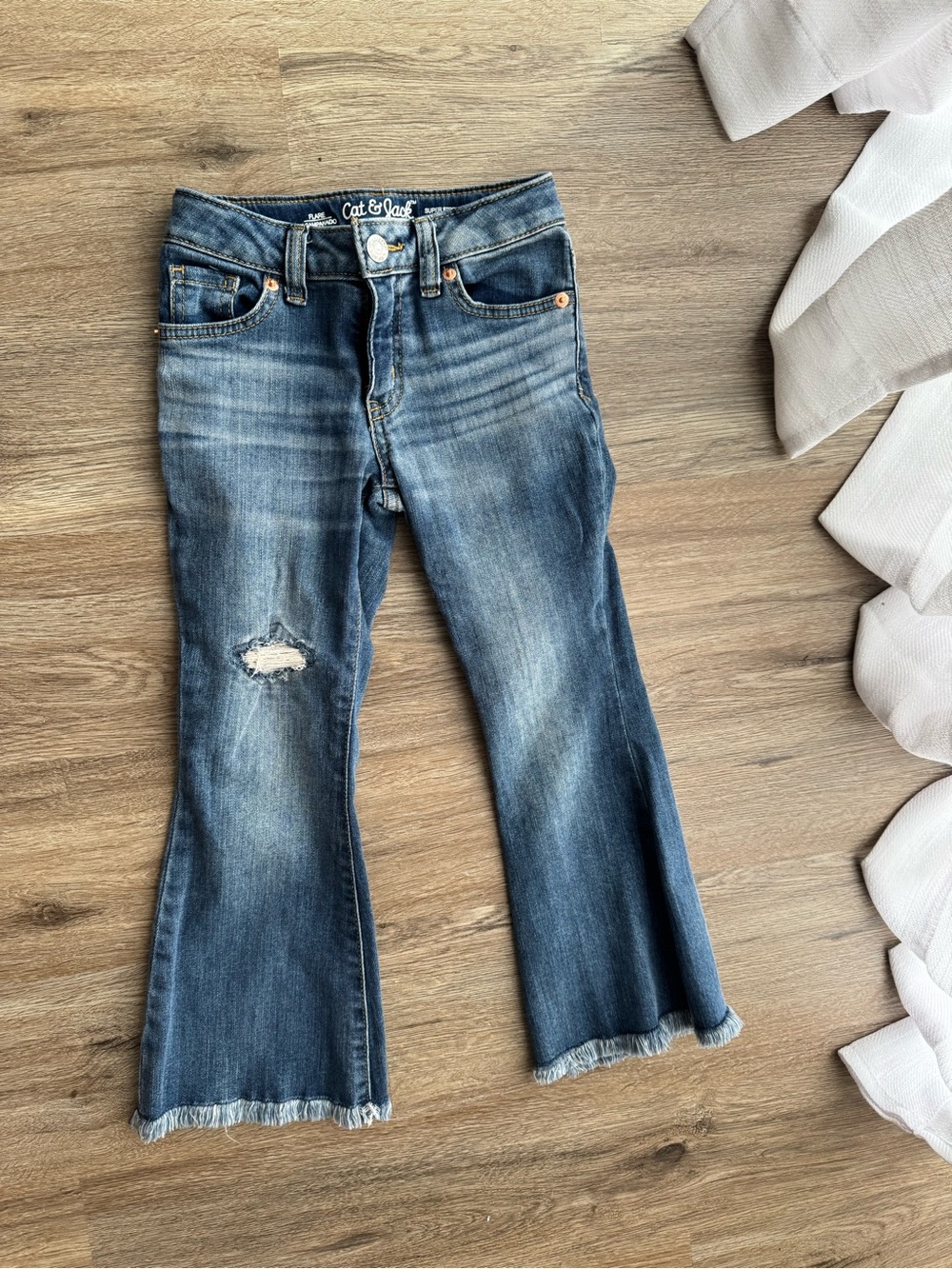 Cat & Jack Girls' Washed Blue Flare Jeans with Distressed Knee